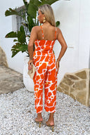 1735579077_Orange-Giraffe-Print-Strappy-Racer-Neck-Jumpsuit-5.jpg