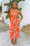 1735579099_Orange-Giraffe-Print-Strappy-Racer-Neck-Jumpsuit-2.jpg