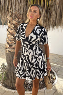 1736446988_Black-And-White-Abstract-Print-Wrap-Top-Skater-Mini-Dress-1.jpg