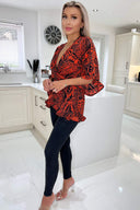 Red And Black Printed Frill Hem Wrap Top